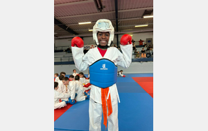 Madeline, première de sa catégorie en kumité.